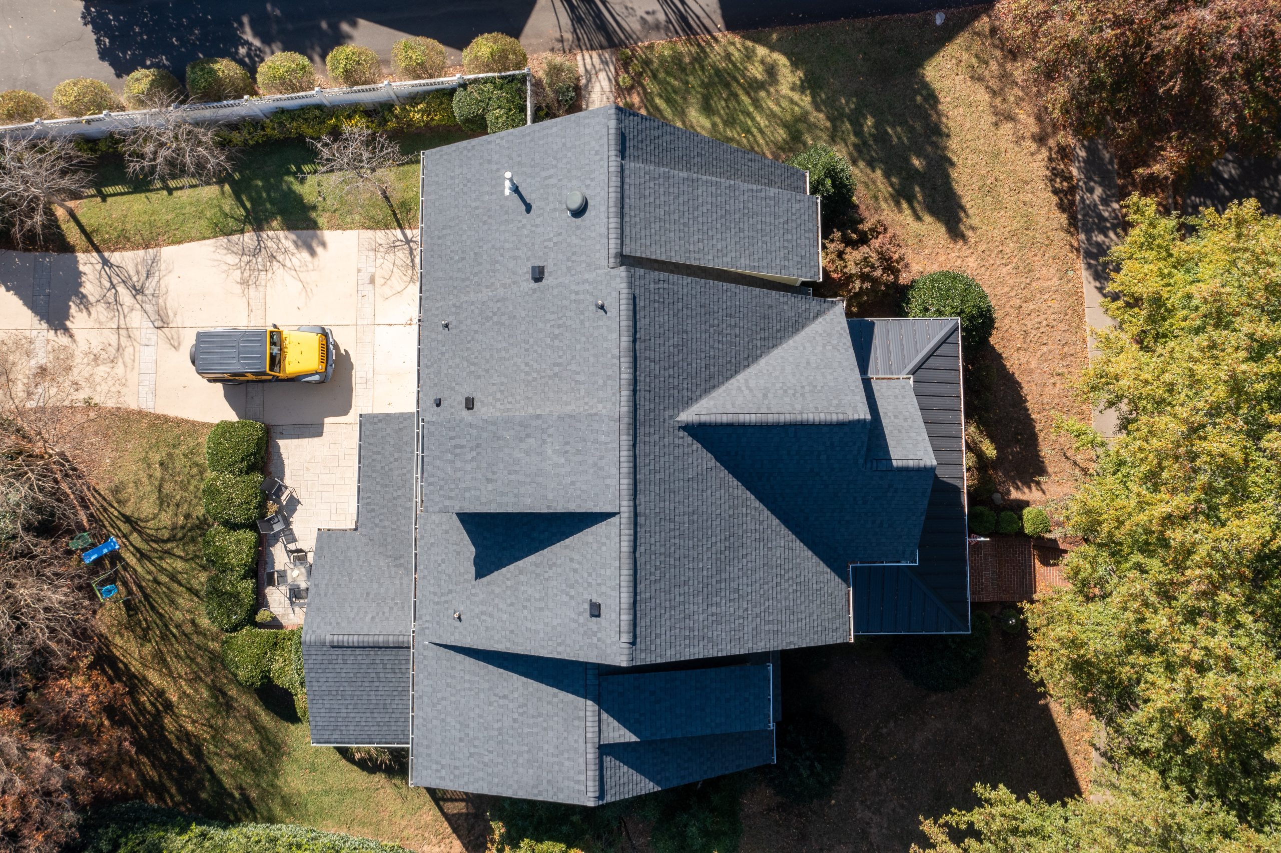 Aerial photograph of newly installed asphalt shingle roof in Raleigh